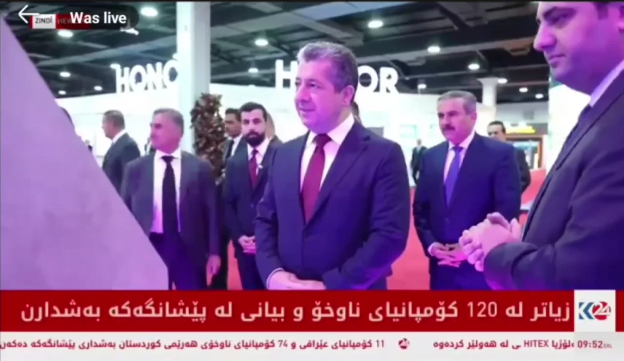Kurdistan 24 broadcasting the Prime Minister&rsquo;s visit to the Aron Fund hologram at HITEX 2025.